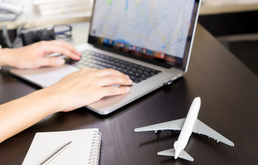 Traveler is using Internet GPS map to plan is vacation trip