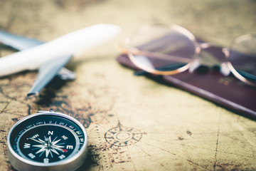 Vintage world travel equipments on map with copy space