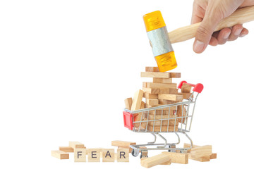 Fototapeta na wymiar blocks wood game (jenga) in shopping cart