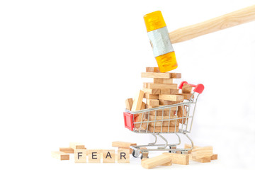 blocks wood game (jenga) in shopping cart
