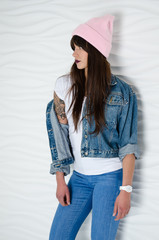 Young sexy woman in pink fashionable hat