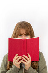 girl holding a book isolated on white background