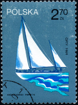 UKRAINE - CIRCA 2017: A stamp printed in Poland shows old sailing yacht opty 1969, circa 1974