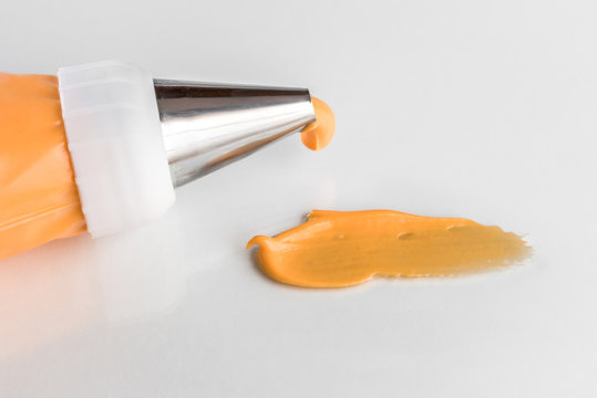 Orange Icing on White Background