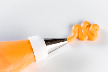 Orange Icing on White Background