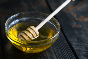 Natural flower honey on a wooden table