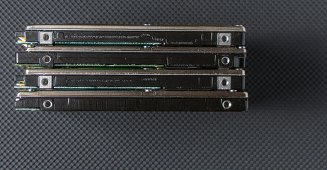 old hard disk drive on black background