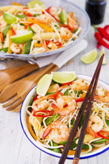 Healthy shrimp and vegetables stir-fry in a bowl, brightly lit