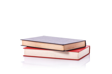 Old book with empty blank cover. Studio shot isolated on white