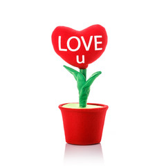 Artificial red heart flower. Studio shot isolated on white