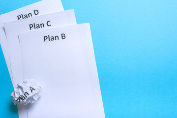 Crumpled paper Plan A and clean sheet Plan B C D