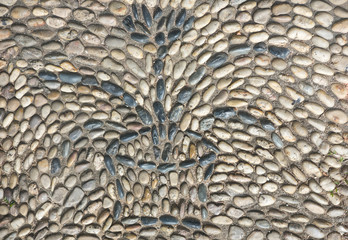 Naklejka premium background made of a closeup of a wall with pebbles