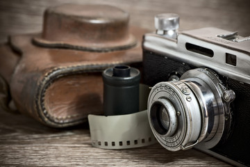 Vintage rangefinder camera with leather case