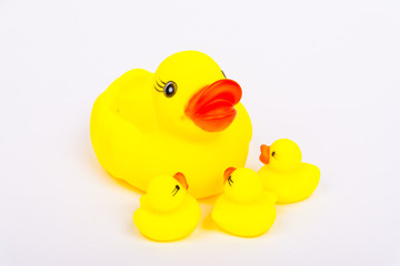 Yellow bath duck toy with little ducks