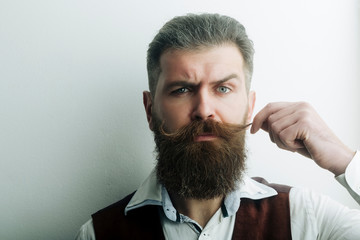 bearded man, brutal caucasian hipster with serious face