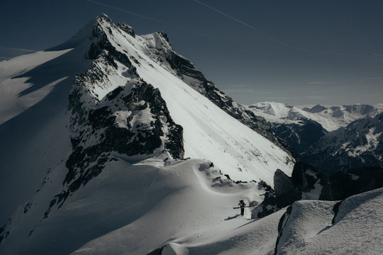 Skimountaineer on a ridge