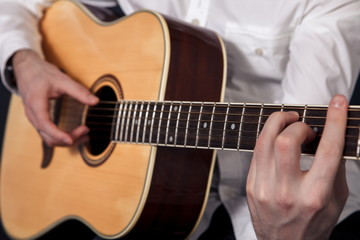 Fototapeta na wymiar man playing classical guitar 