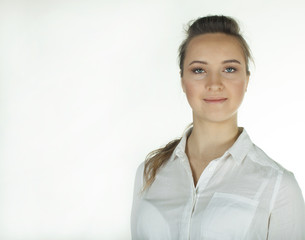 
Young   woman in  white blouse. Portrait .White background with place for text
