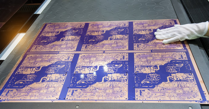 PCB Processing on CNC machine working in factory