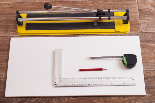 tile cutter on the floor