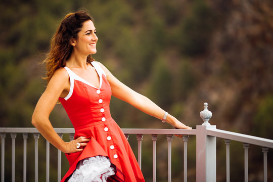 beautiful happy girl in dress in Spain for holidays and modelling