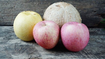 Multiple fruits. Fruits on the wood table.
