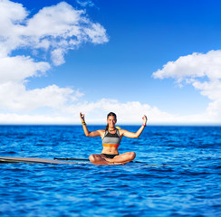 Fototapeta na wymiar Yoga girl over SUP Stand up Surf board