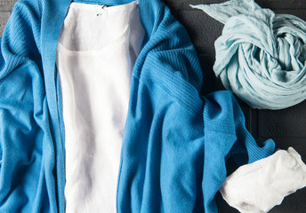 Turquoise cardigan and white linen dress, scarf, soft focus, horizontal