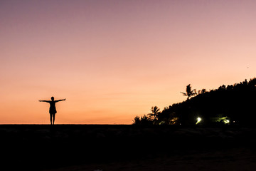 Bali dancing girl silhouette Sanur Beach sunset