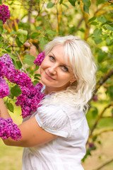 Fototapeta premium Portrait of a blonde in a lilac