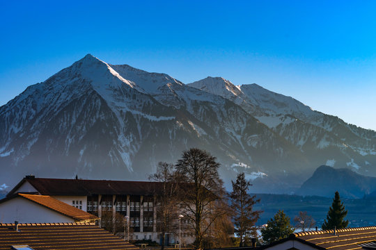 Beautiful snowy mountains, sunny day in Alps