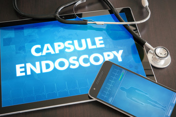 Capsule endoscopy (gastrointestinal disease related) diagnosis medical concept on tablet screen with stethoscope