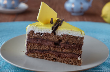 Delicious dessert cake with chocolate cream and coffee