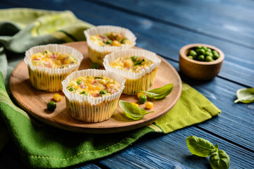 Mini frittatas with ham, pea, cheese and corn