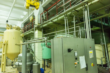 Special industrial equipment in the workshop of a factory for the production of wines and champagne