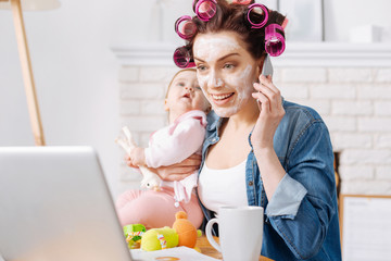 Active modern mom making a job interview appointment