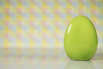 Easter theme. handmade Egg  bokeh background, place for typography, Happy Easter