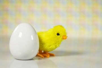 Easter theme. handmade Egg  bokeh background, place for typography, Happy Easter