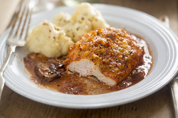 Chicken in red wine with bacon crumb and chestnut mushrooms