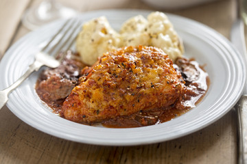 Chicken in red wine with bacon crumb and chestnut mushrooms
