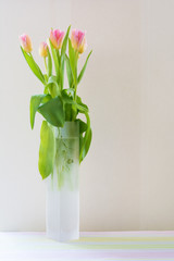 Bouquet of spring flowers, pink and yellow tulips.