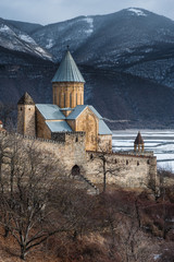 Fototapeta na wymiar Ananuri fortress in winterat sunny day. Georgia.