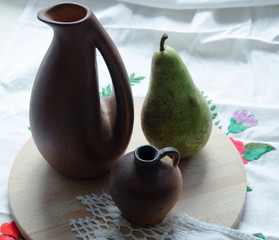 Jugs of different shapes like pear