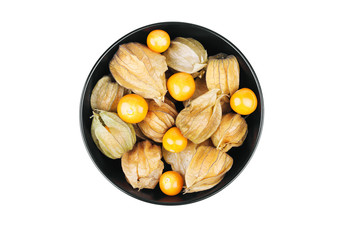 Ripe physalis in bowl isolated on white background