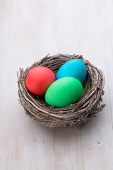Easter eggs in the nest. Spring discount card.
