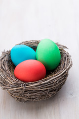 Easter eggs in the nest. Spring discount card.