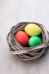 Easter eggs in the nest. Spring discount card.