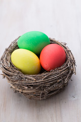 Easter eggs in the nest. Spring discount card.