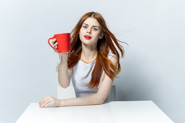 woman with red mug 