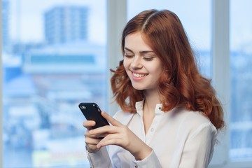 Fototapeta na wymiar business woman with phones sms 